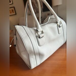White leather Uterque bag. As new with minor stain underneath bag.